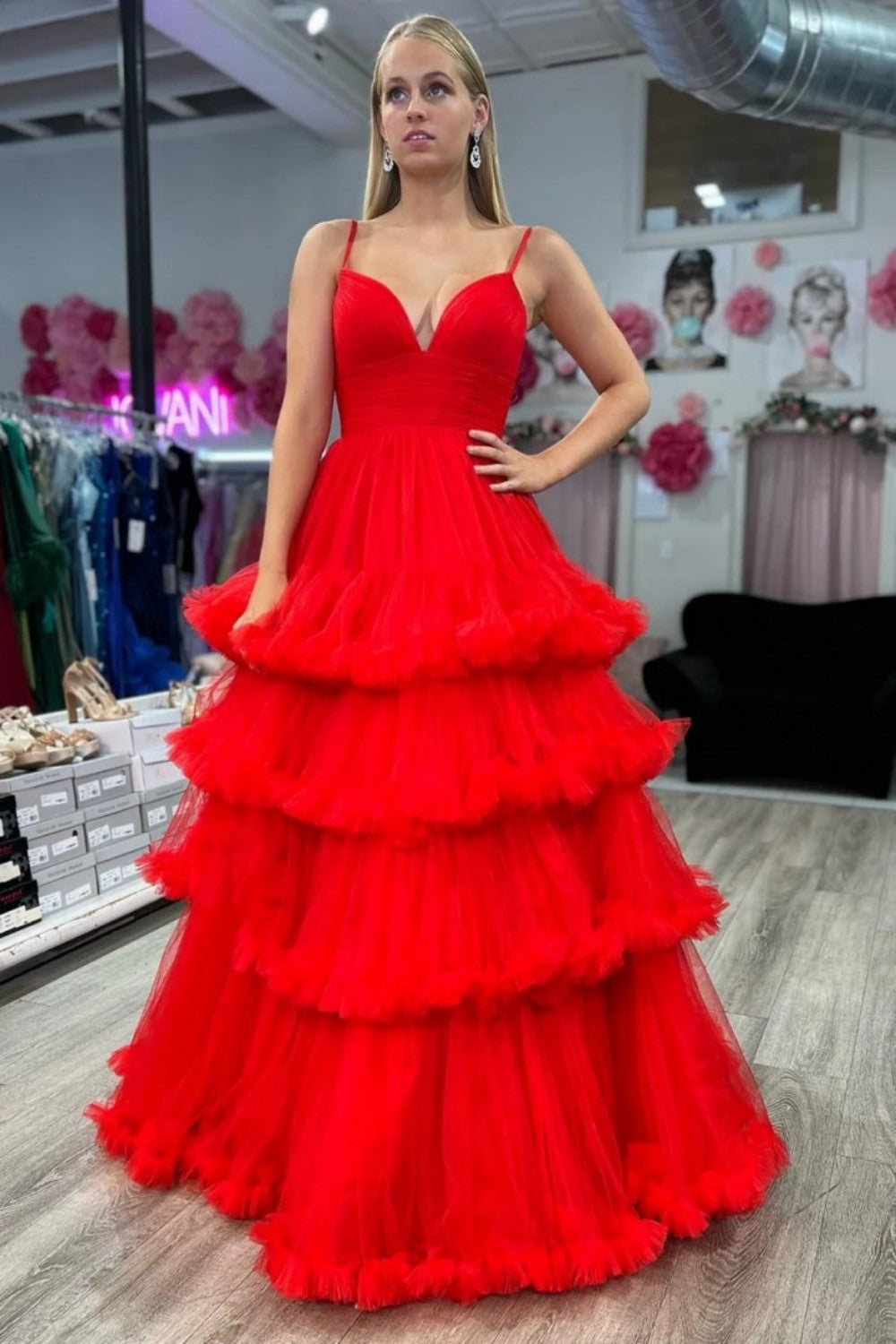 A-line V-neck tulle ball gown with double straps and multi-layered ruffles. Customizable in multiple colors.