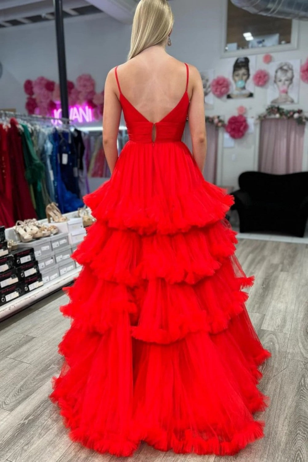 A-line V-neck tulle ball gown with double straps and multi-layered ruffles. Customizable in multiple colors.